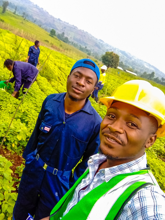 Charles Baraka Nteranya (with fellow agronomists) during field experimentation, following a hands-on training session on sustainable farming techniques